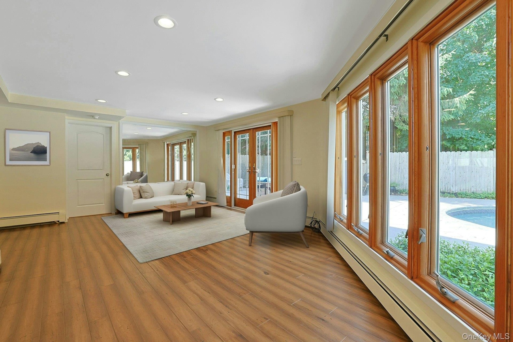 As throughout most of the home, this room is graced by hardwood floors in perfect condition. It would also make an amazing music room.