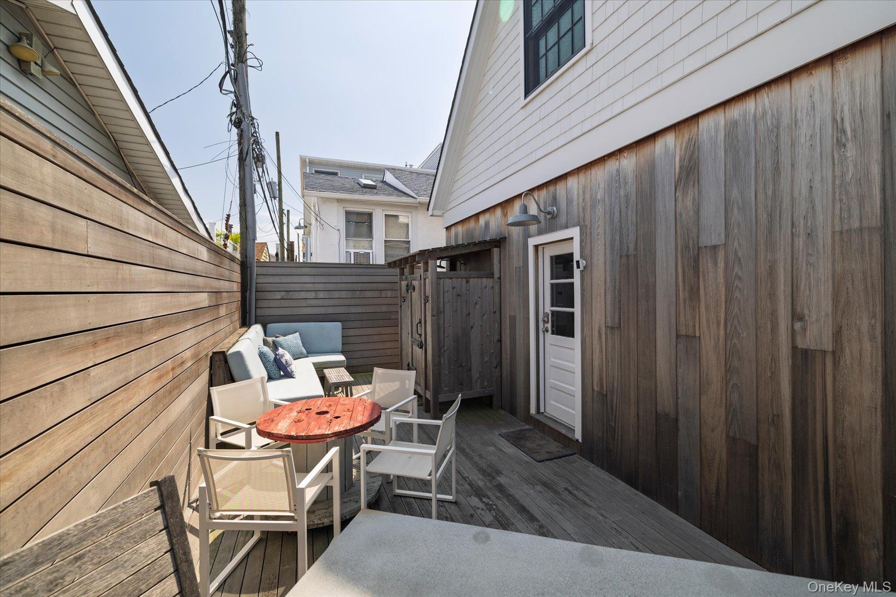Private deck with an outdoor shower