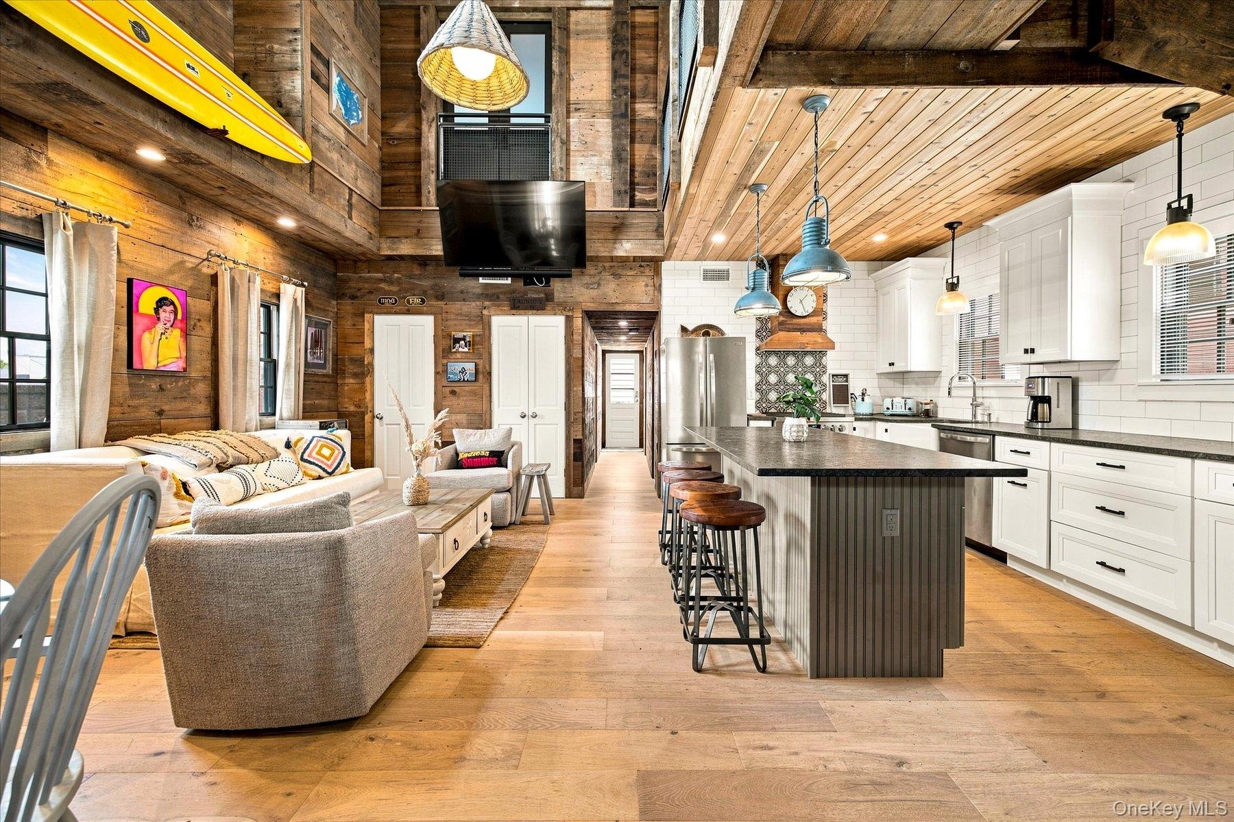 Vaulted wood-paneled ceiling with exposed beams