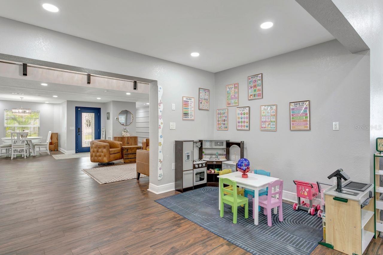 Flex Space adjacent to the Kitchen - May serve as Formal Dining, Play Room, Office Space, etc.
