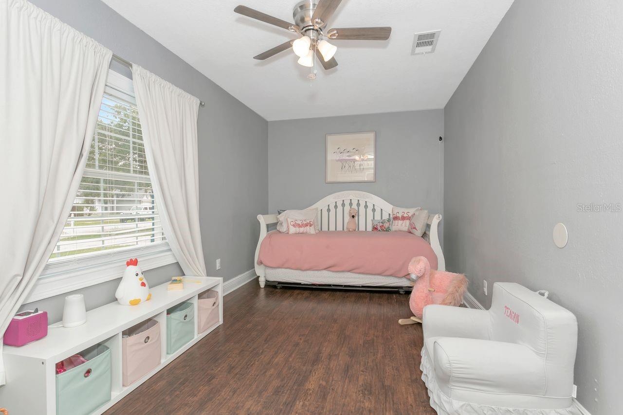 Bedroom #2 with LVP Flooring; Ceiling Fan; Extended Built-In Closet