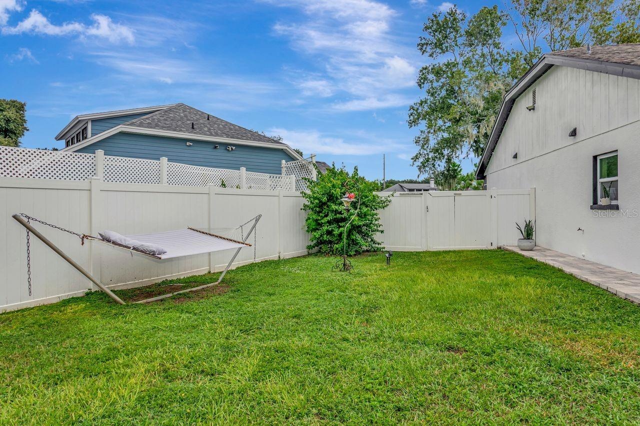 Backyard, Fully Fenced, Gates on Both Sides, Pavered Walkway on the side of home. Live YOUR Way in Riverview, Fl