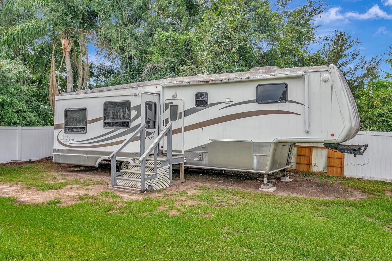 View of RV and Stairway leading to Entrance.