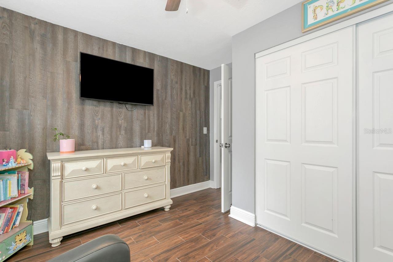 Bedroom #3 with LVP Flooring; Ceiling Fan; Extended Built-In Closet