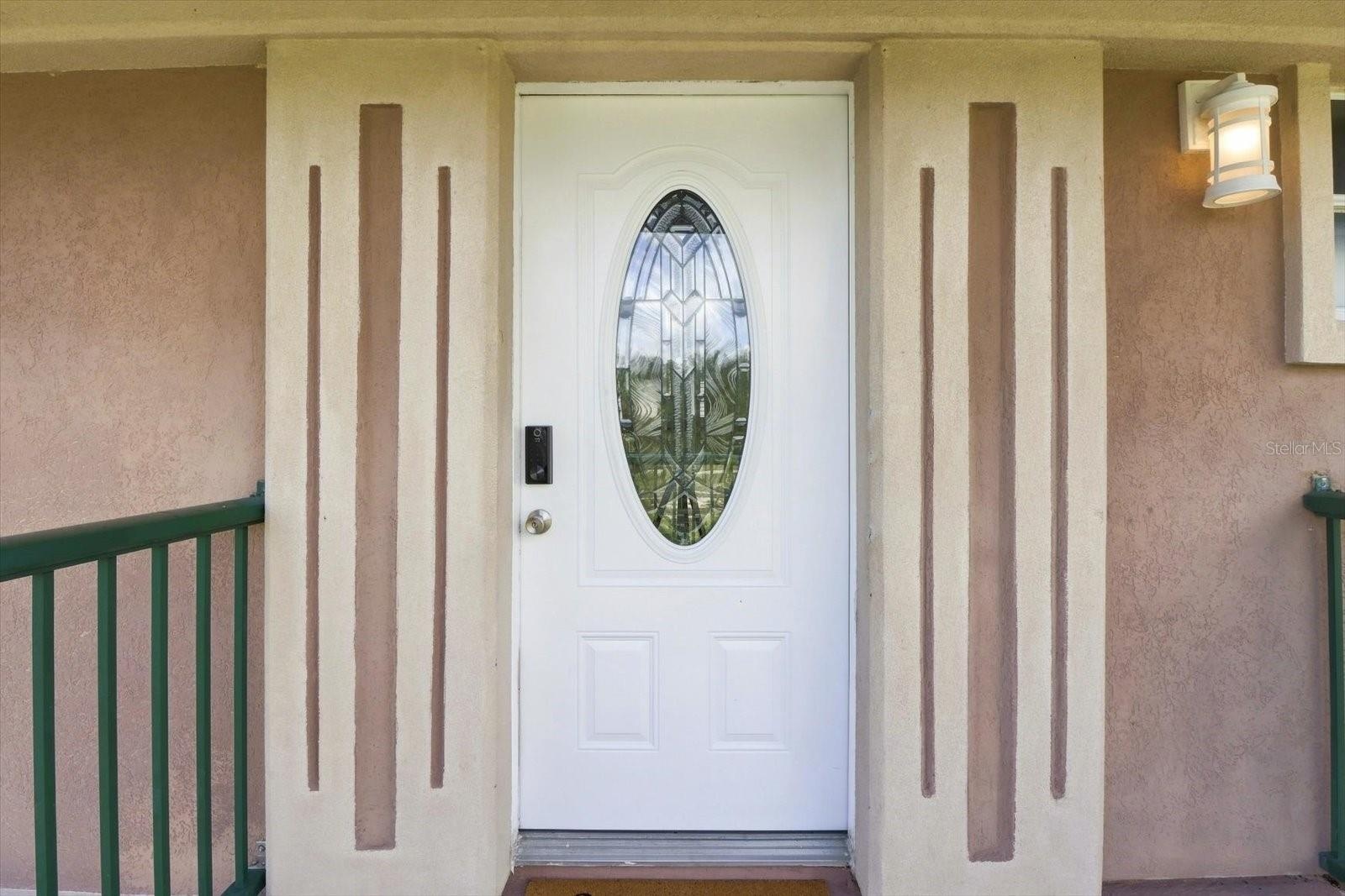 Covered front entry to the main residence.