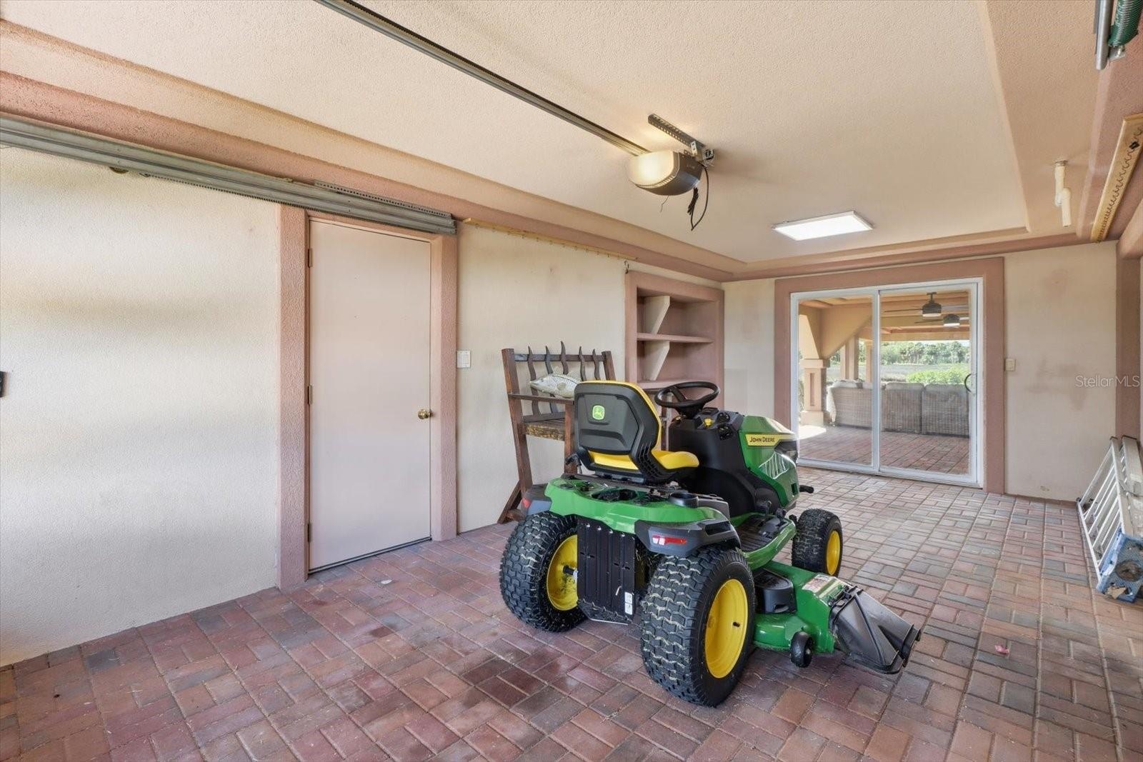 Ground-level garage and storage area.