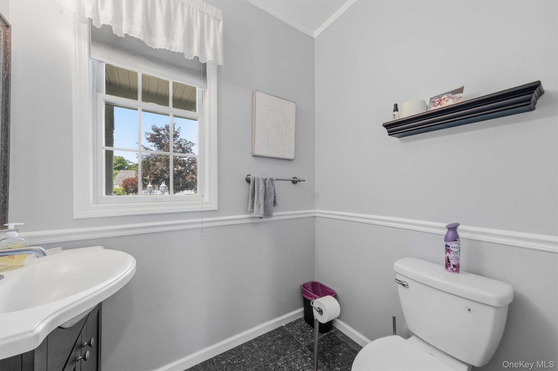 An updated half bath completes the first floor.