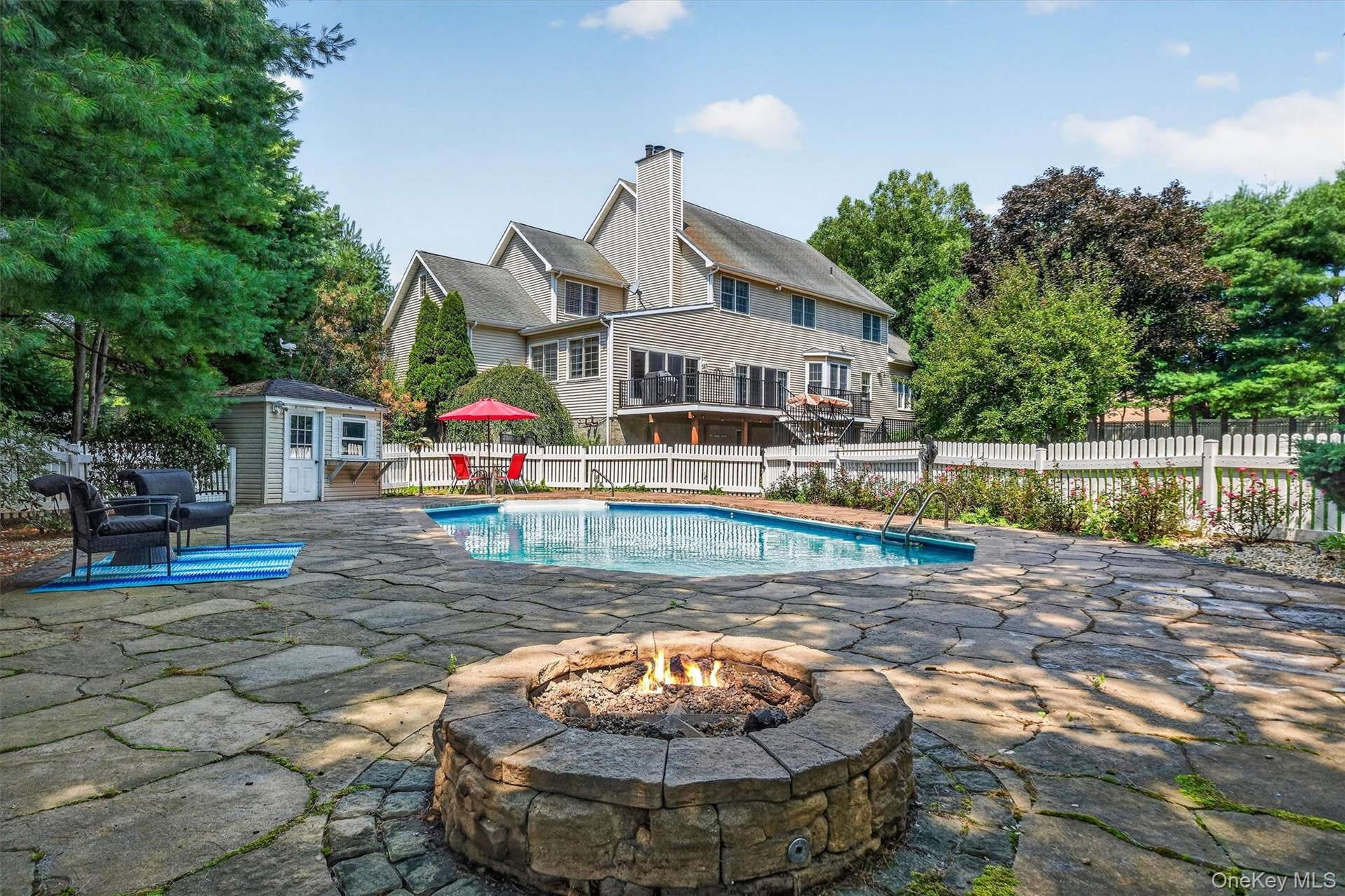Sit around the fire pit when the weather starts to cool down!