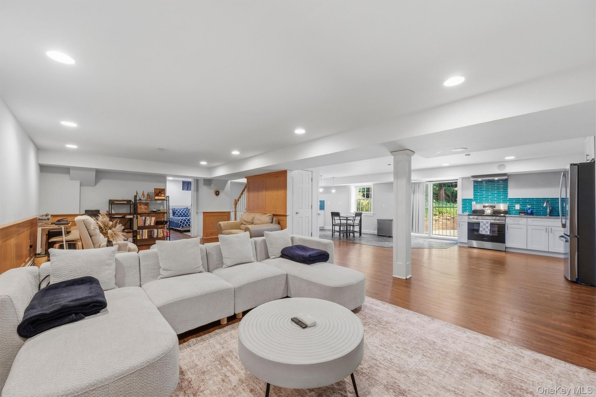 This basement offers a long list of conveniences for overnight guests or live-in childcare.