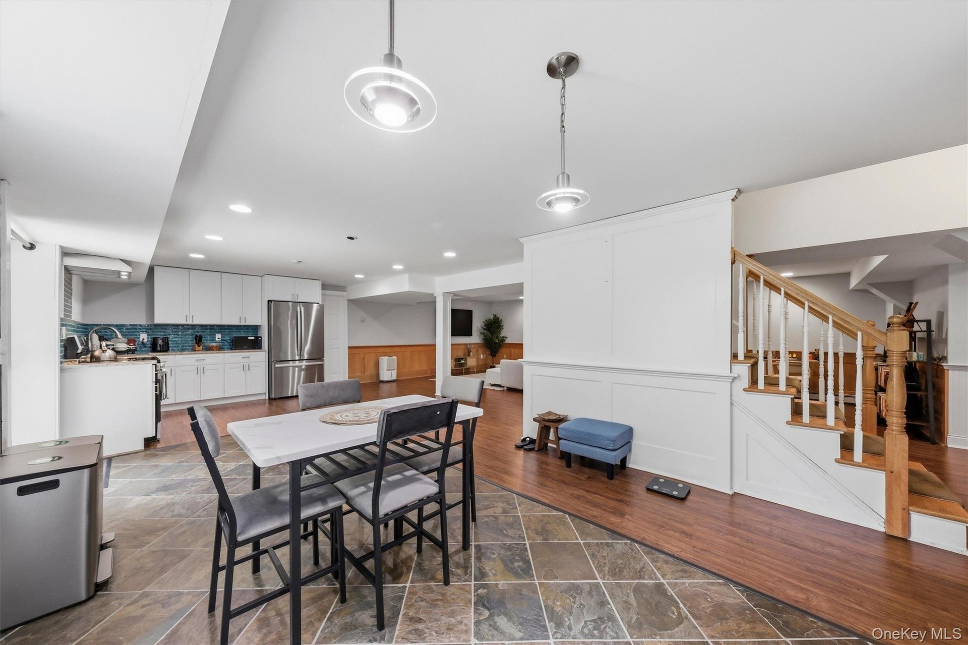 Lower-level dining area and kitchenette.