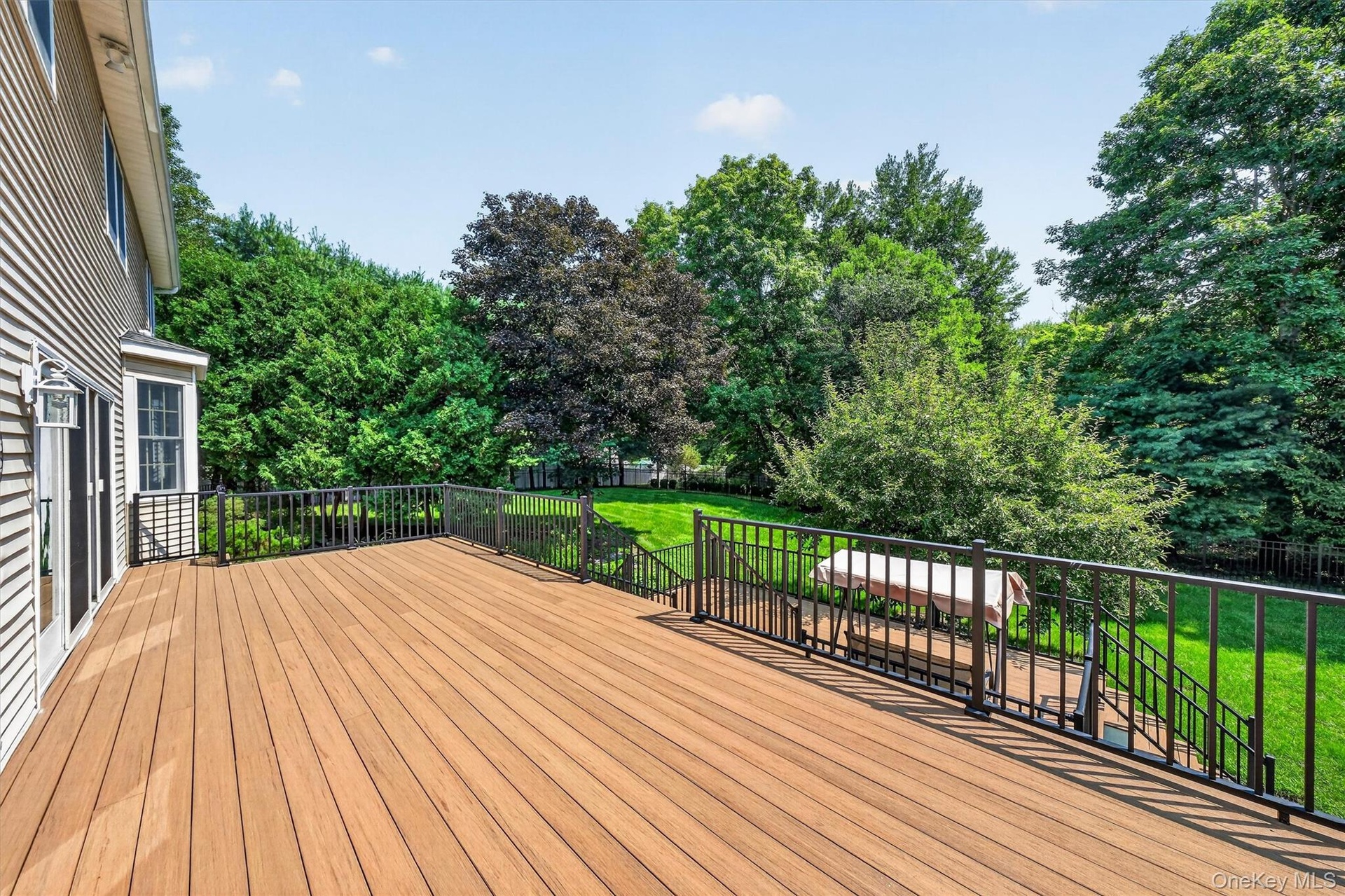 The deck runs the full length of the house!