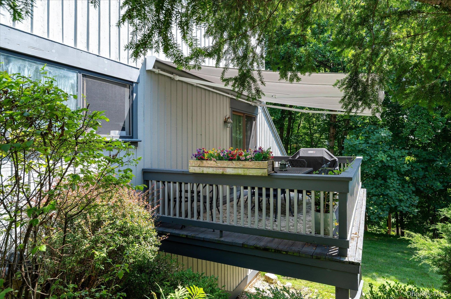 Main level deck with retractable awning