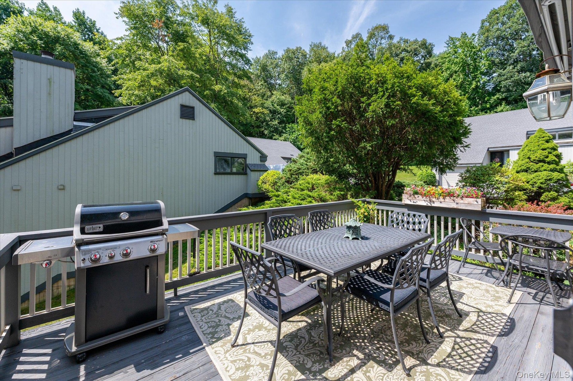 Deck off living room with awning retracted