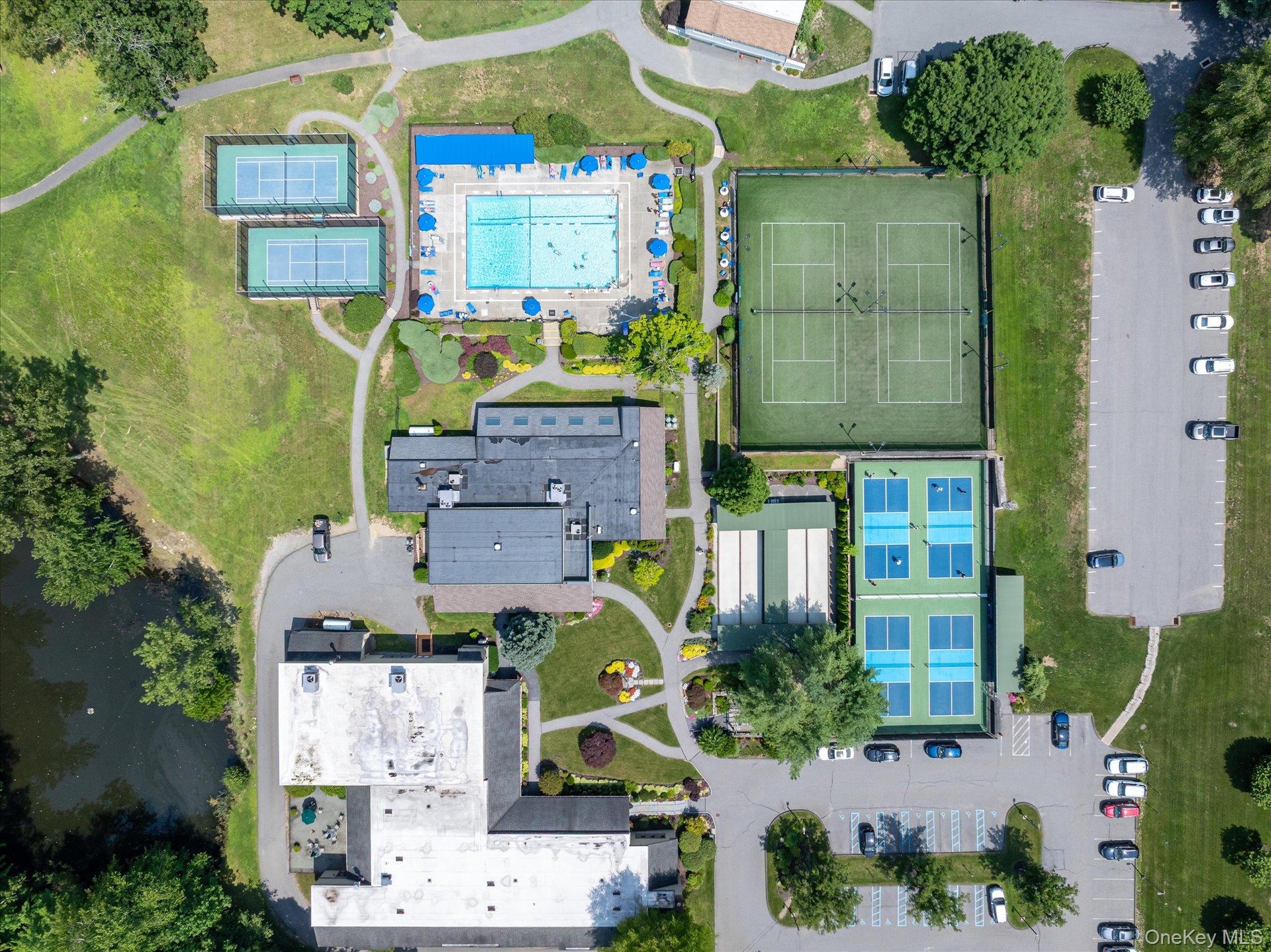 Multiple tennis courts, outdoor swimming pool, pickleball courts, bocce ball courts,