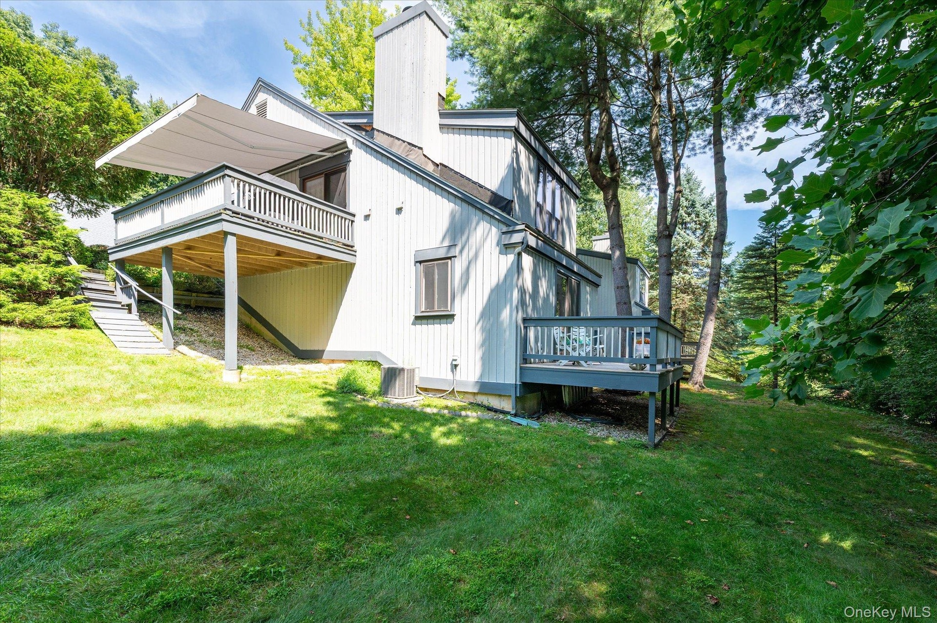 Side elevation showing main level deck and lower deck