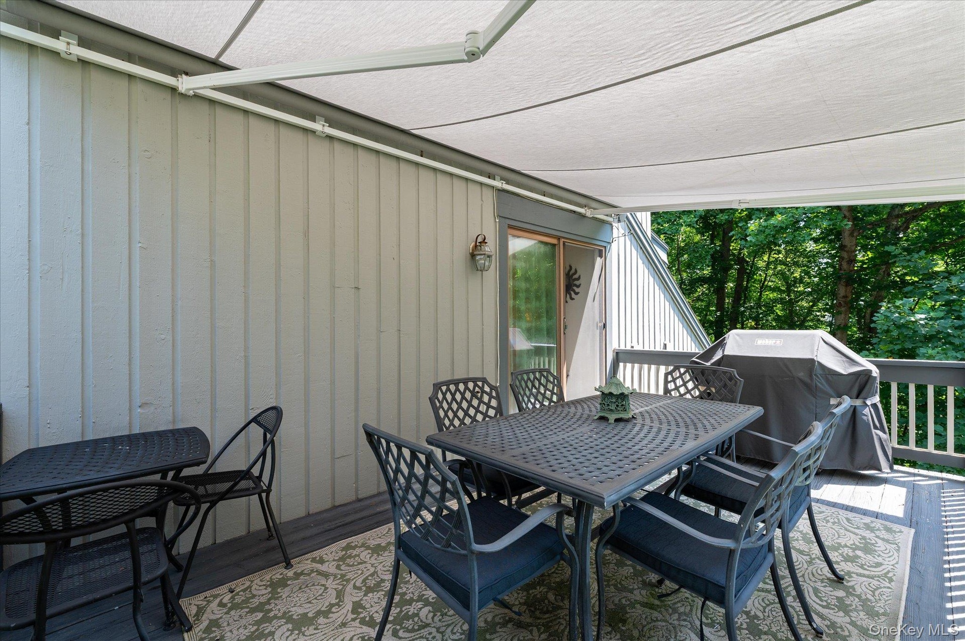 Covered (retractable awning) deck off living room