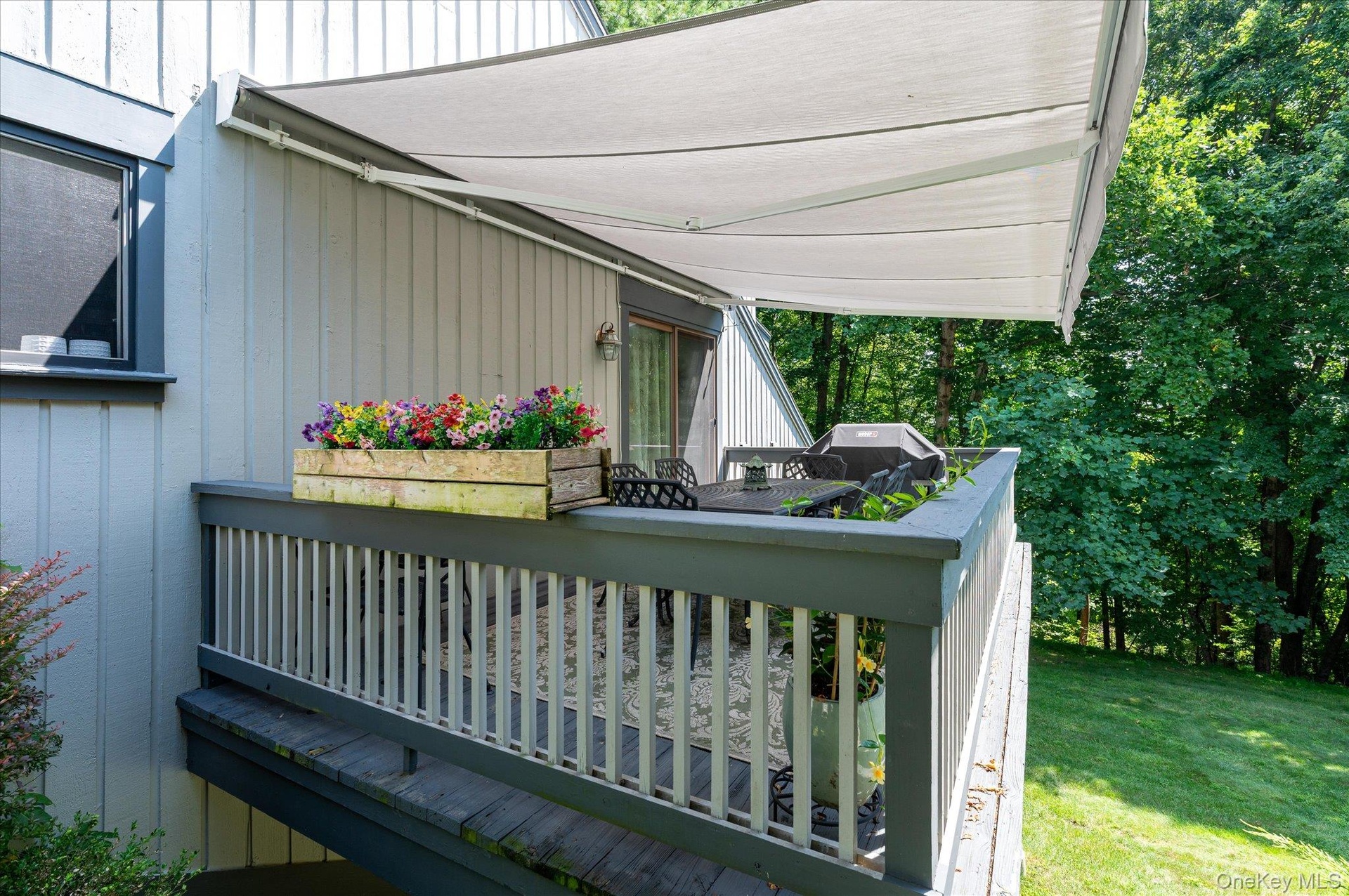 Main level deck with retractable awning