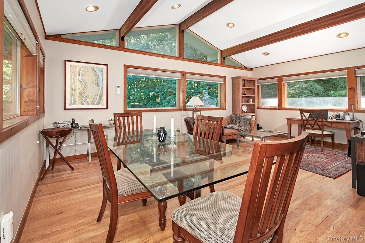 View of the dining area open to sitting area/den.