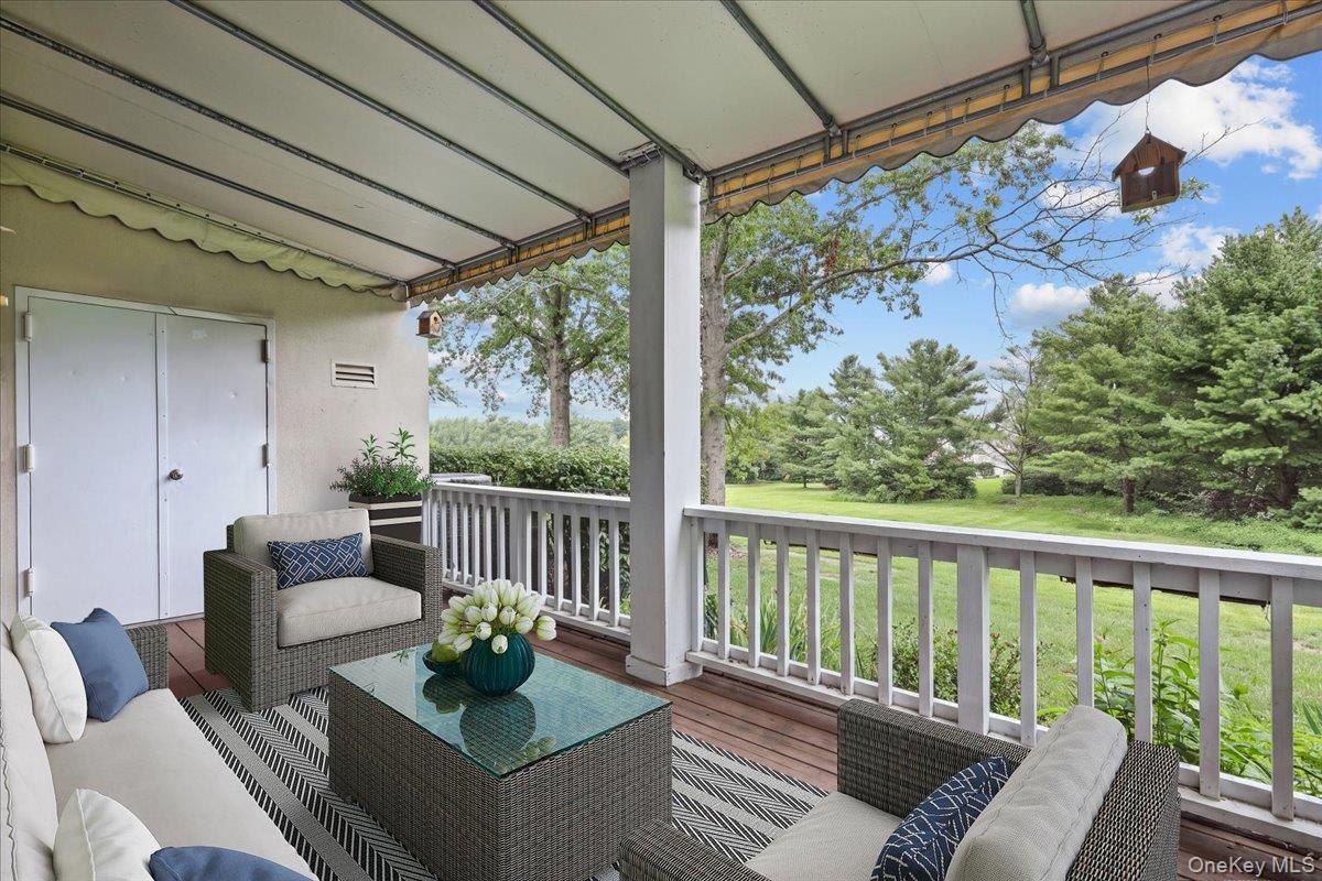 Covered deck - Furniture virtually staged.