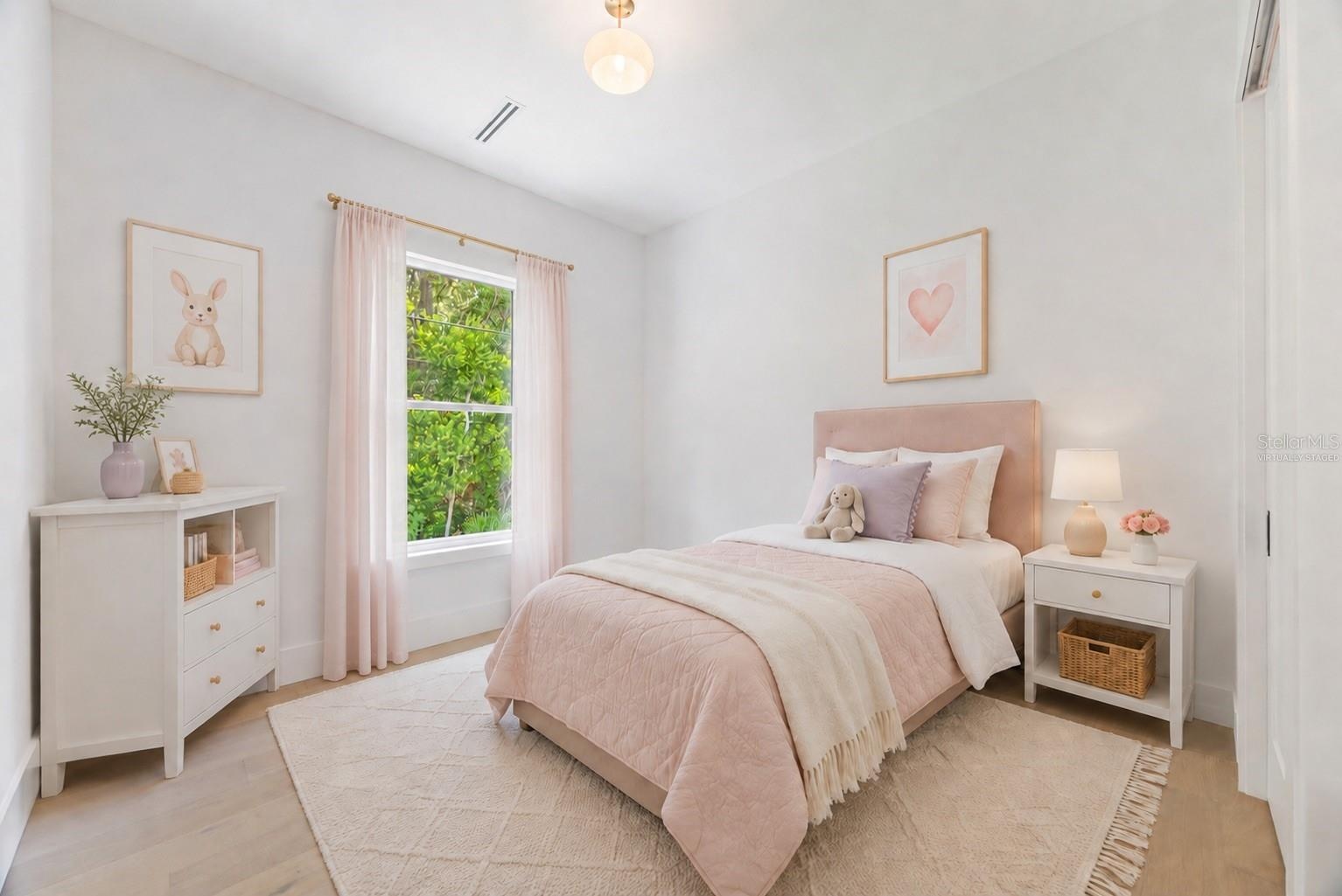 Virtually staged. Bedroom 2 is generously sized and conveniently located near a full guest bathroom.