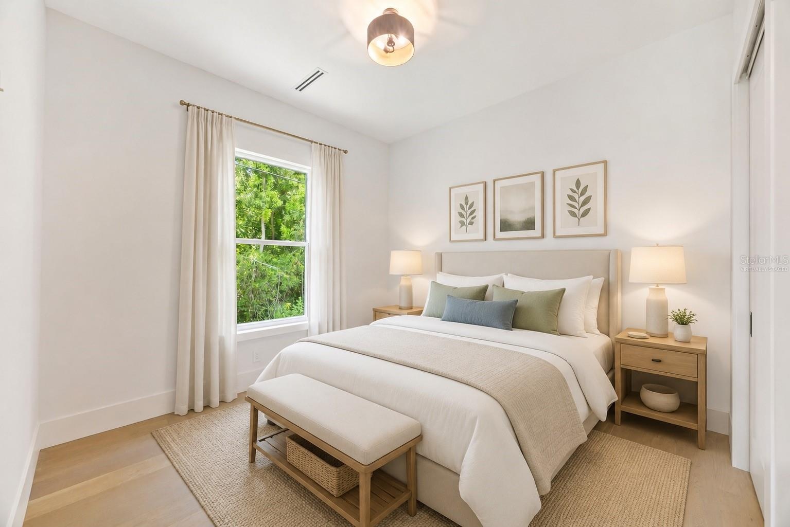 Virtually staged Bedroom 4 enjoys a private en-suite bath with direct exterior access to the lanai, providing an ideal guest retreat and future pool b
