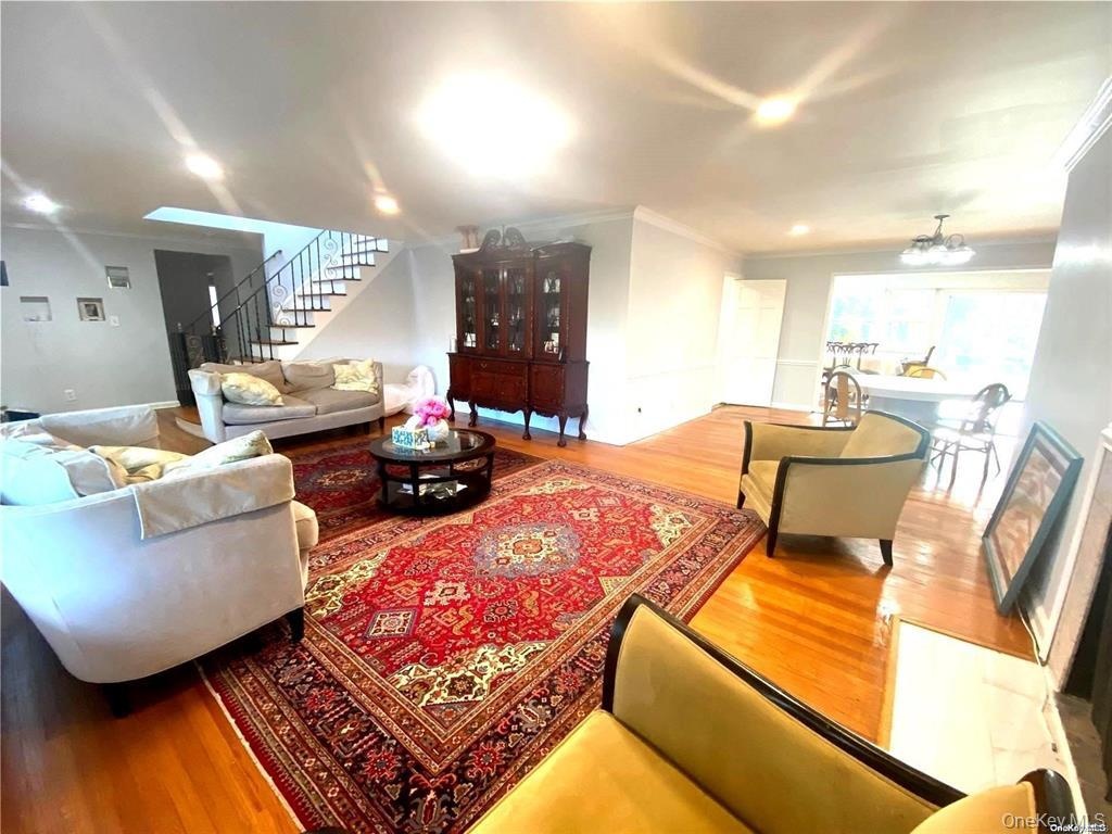 Hardwood flooring throughout, recessed lighting, crown molding