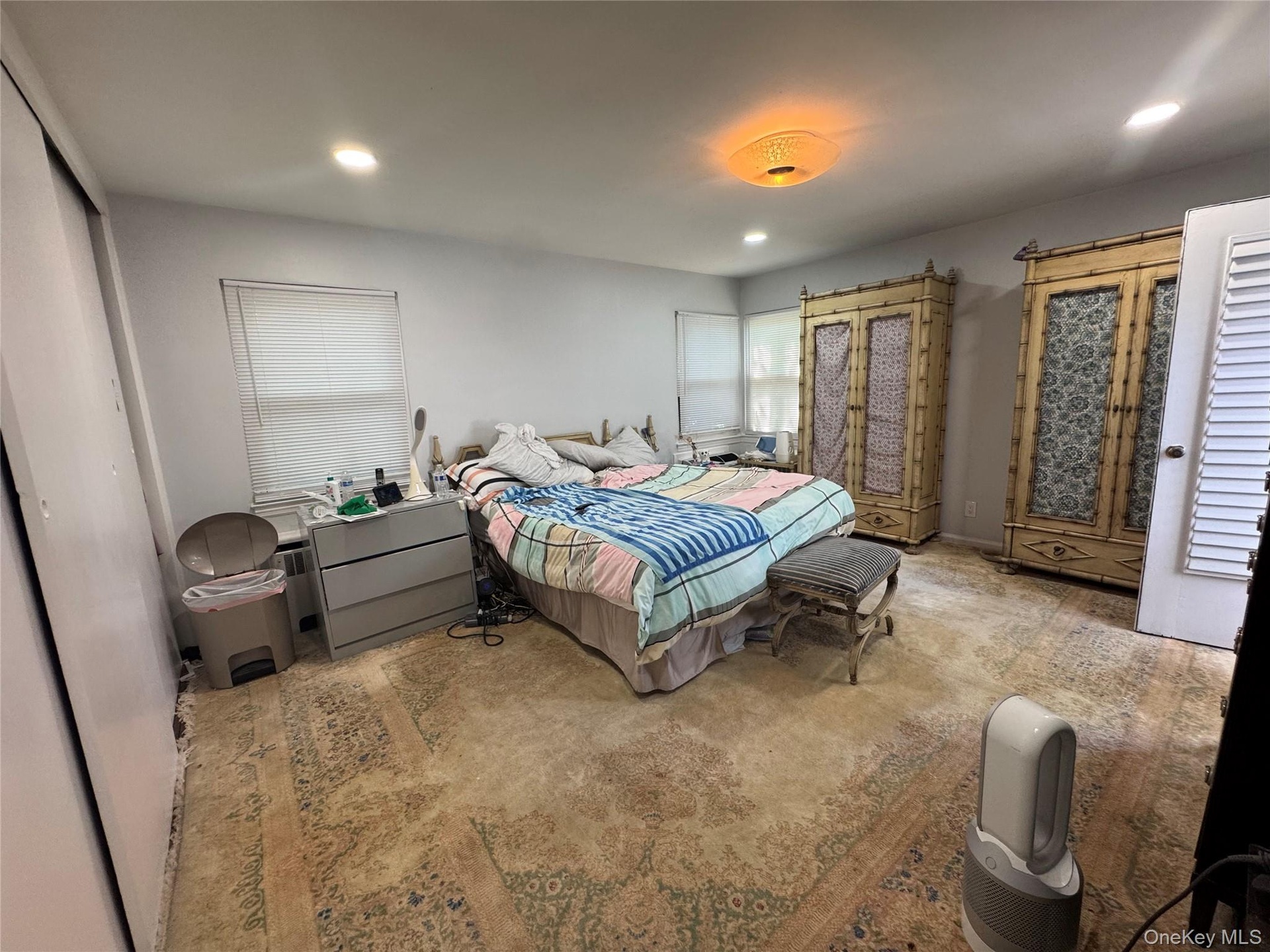 Primary Suit e With Full Bathroom and Door to Backyard.