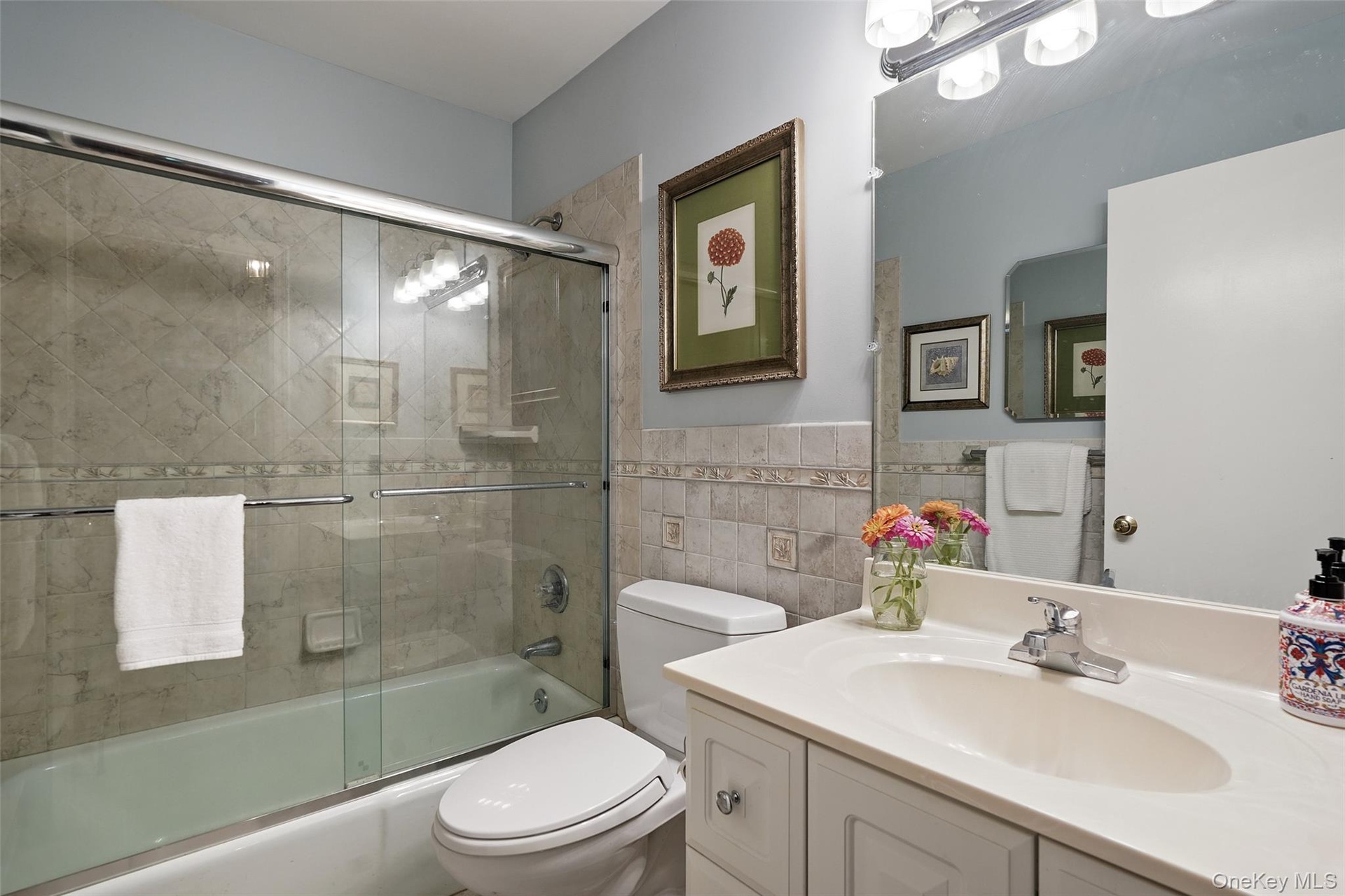 Hall bath with tub and shower