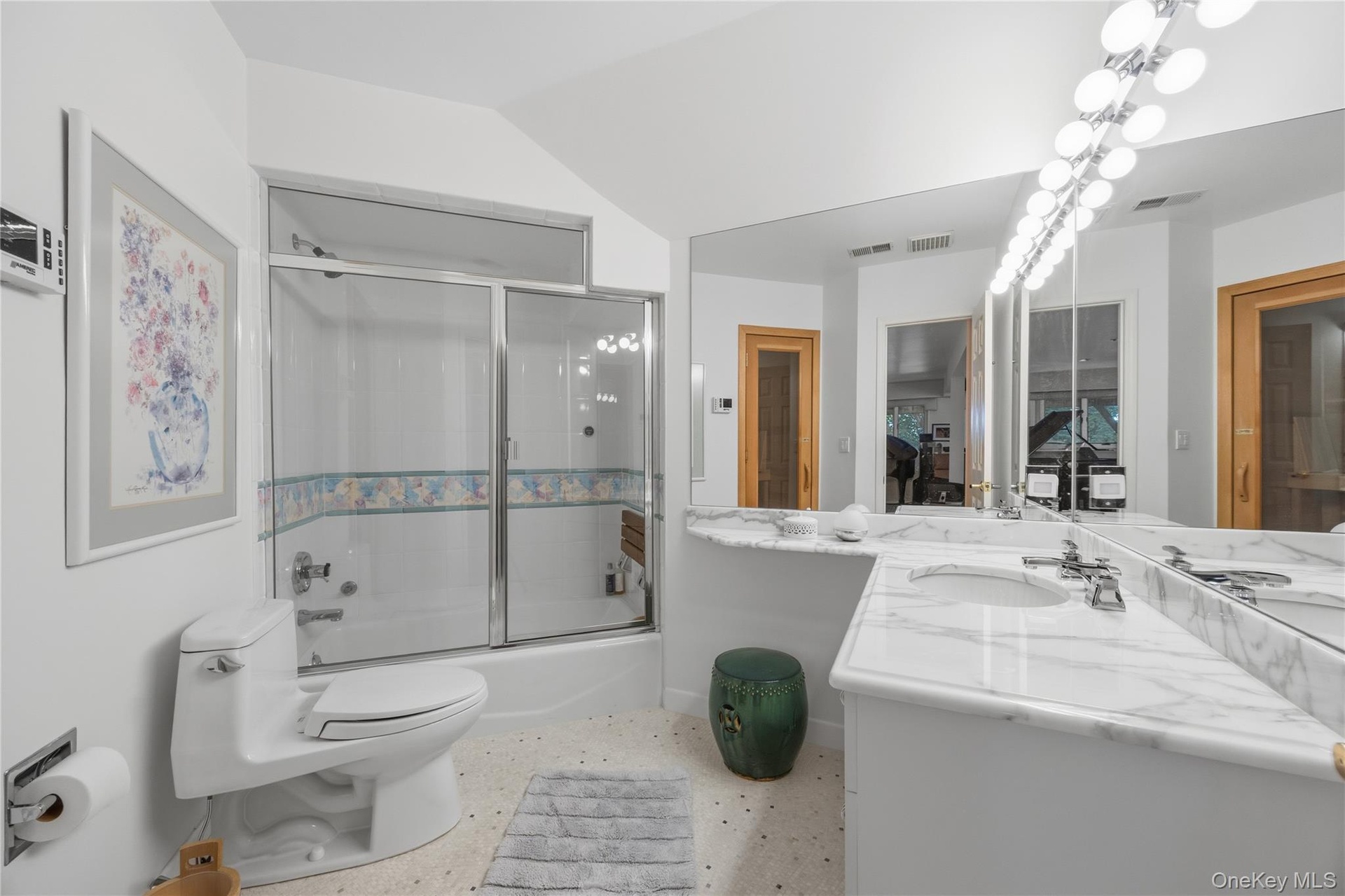 Large Full Bathroom with bathtub and sauna on lower level