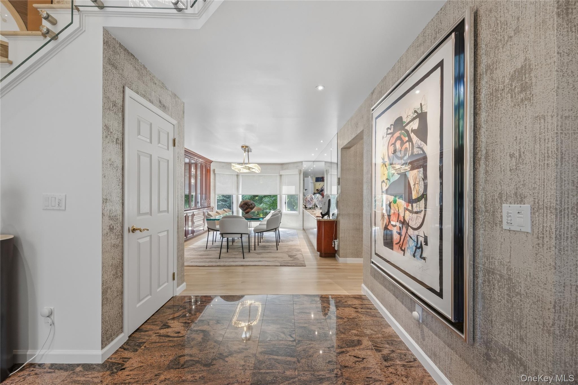 View from entrance foyer through to the sunlit Dining Room