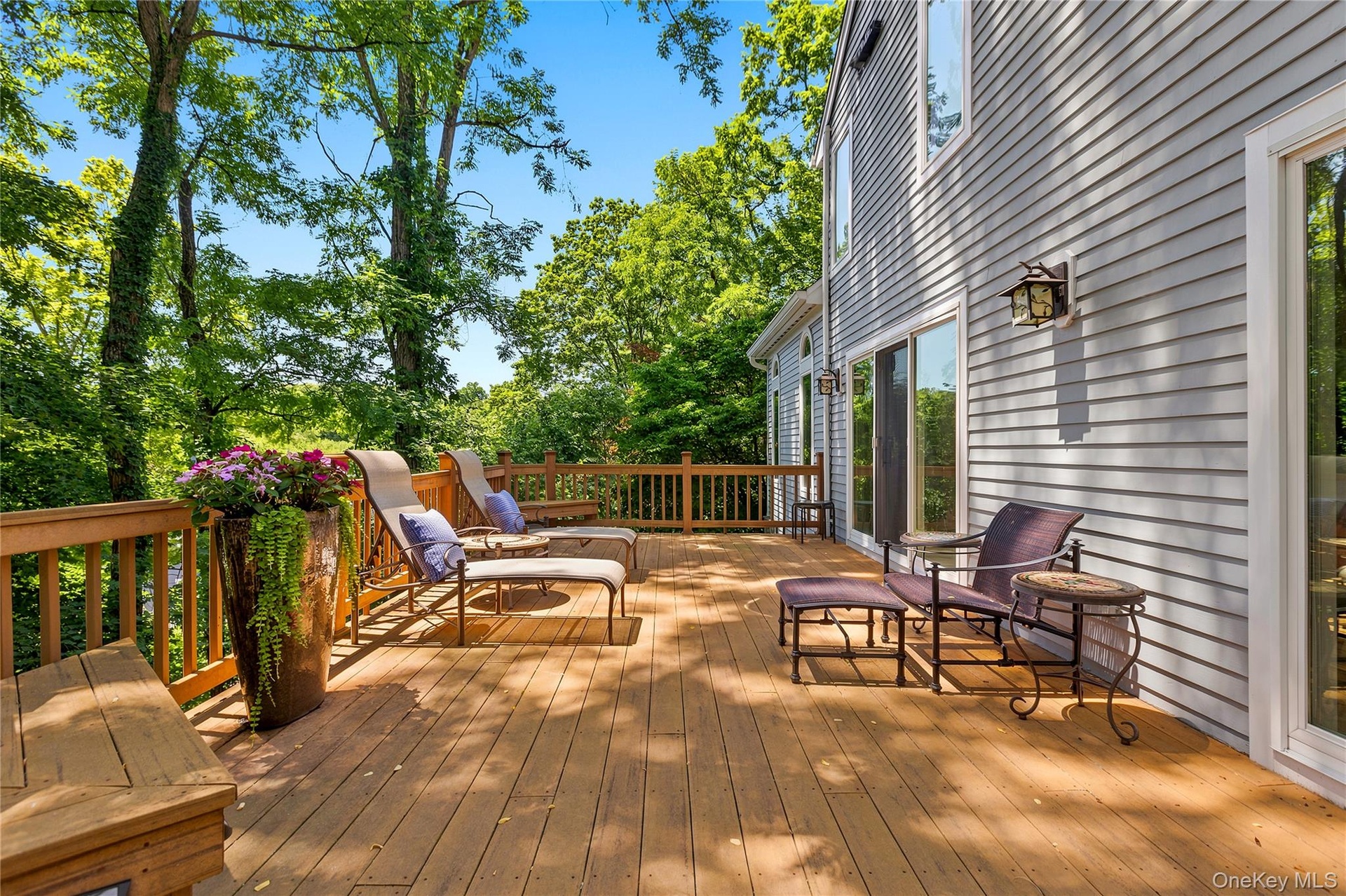 This wrap-around Deck provides sun and shade and sunset views and is perfect for entertaining (large or small gatherings).