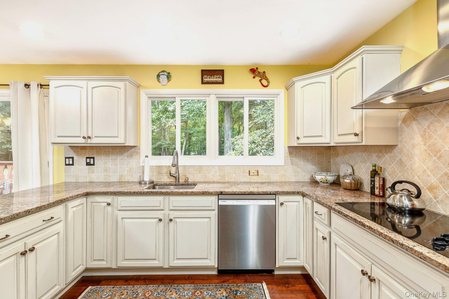 Kitchen - Bright Cabinets and Granite Counters