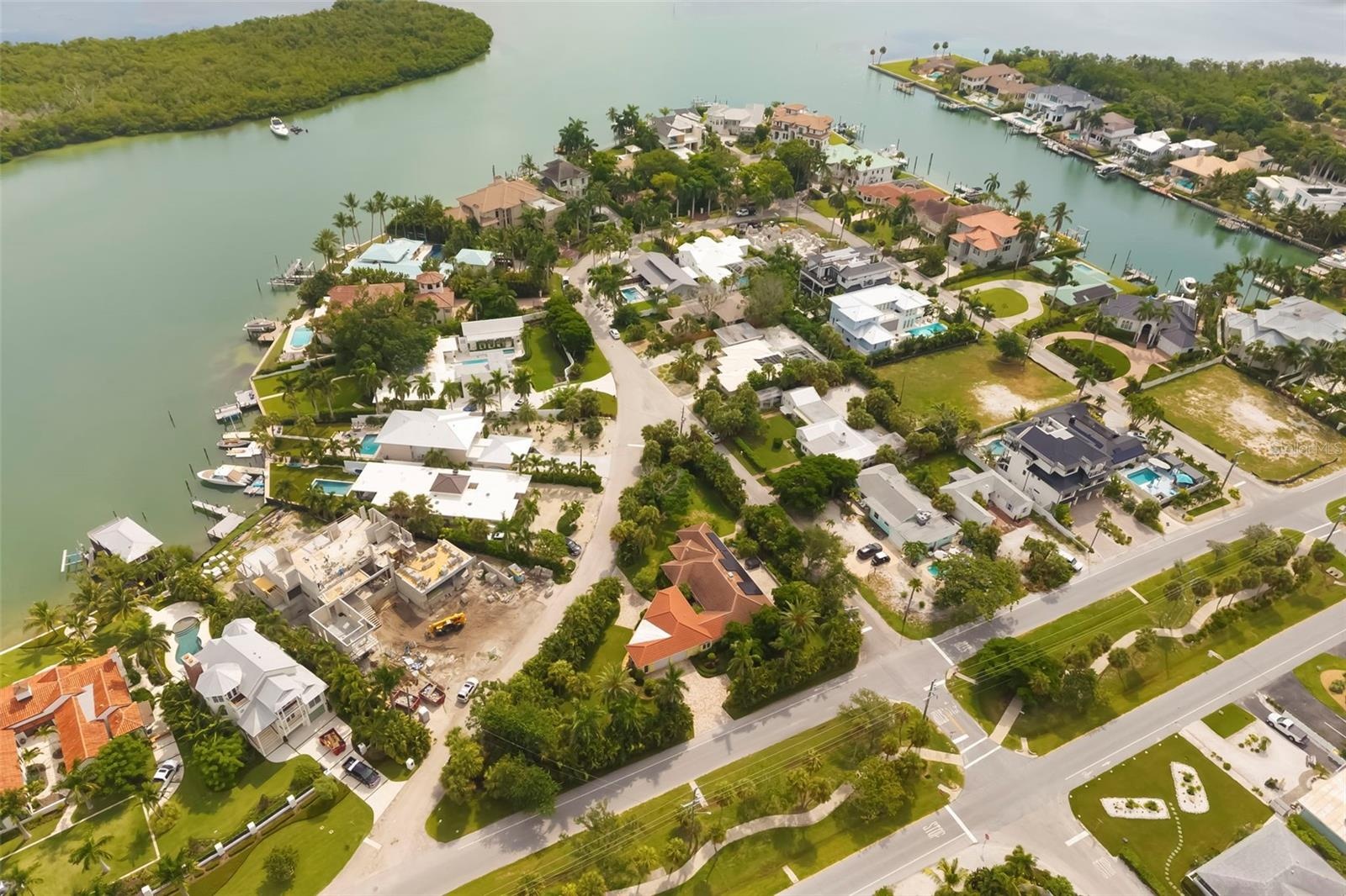 Surrounded by mega million dollar house with a street that ends at the water