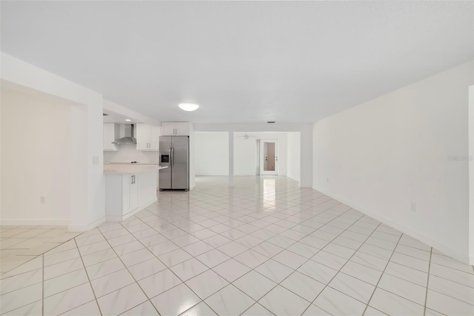 Living Room with a glimpse of the remodeled Kitchen and the Dining Room