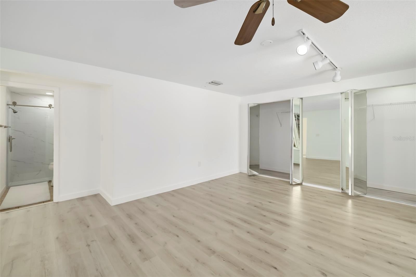 Primary with a remodeled full bathroom