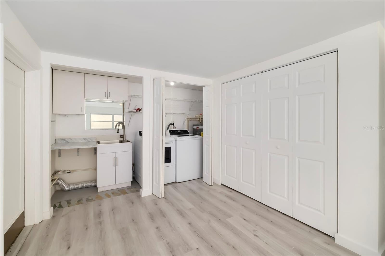 There is a door that leads out to the yard from this 4th Bedroom