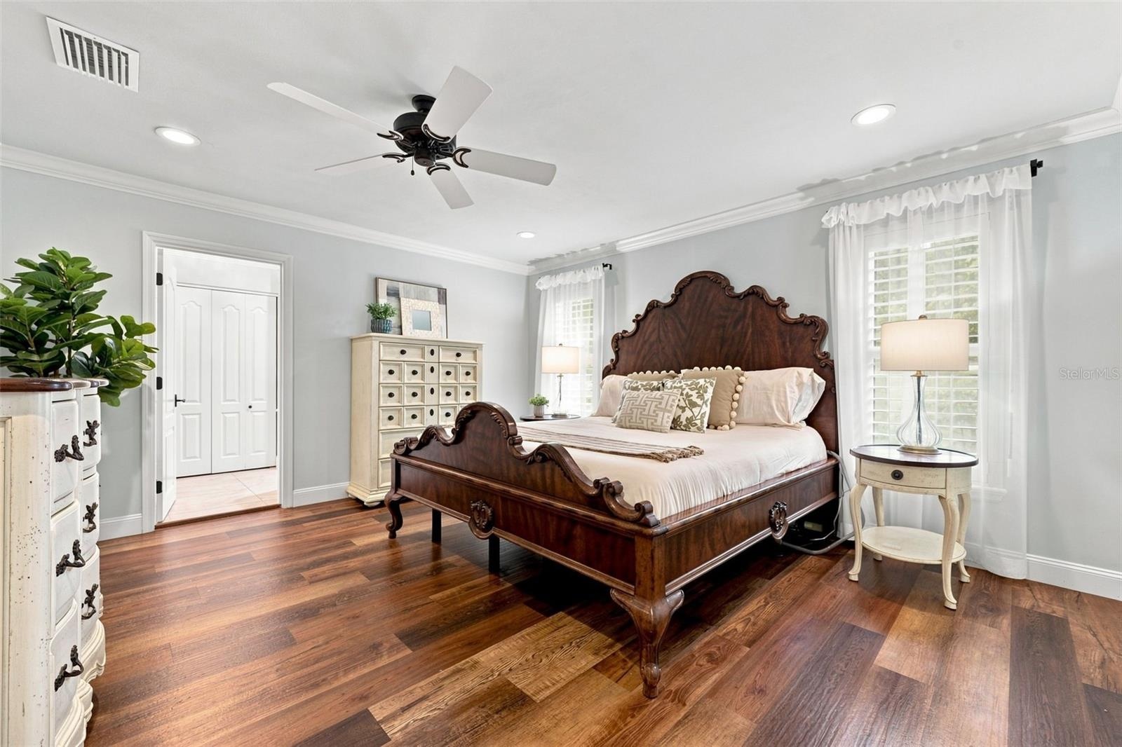 The primary suite features a large walk-in closet with an updated bedroom and en-suite bath (2022)