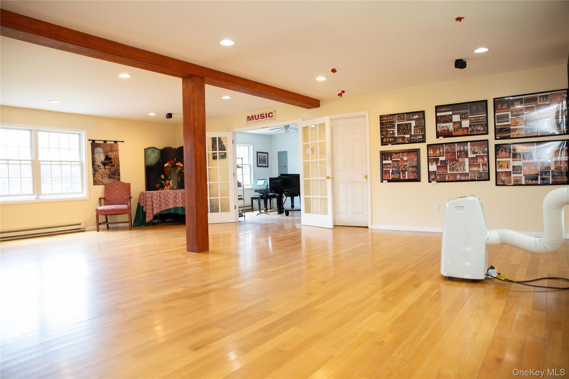 Second commercial space has wide open rooms and rooms perfect for offices