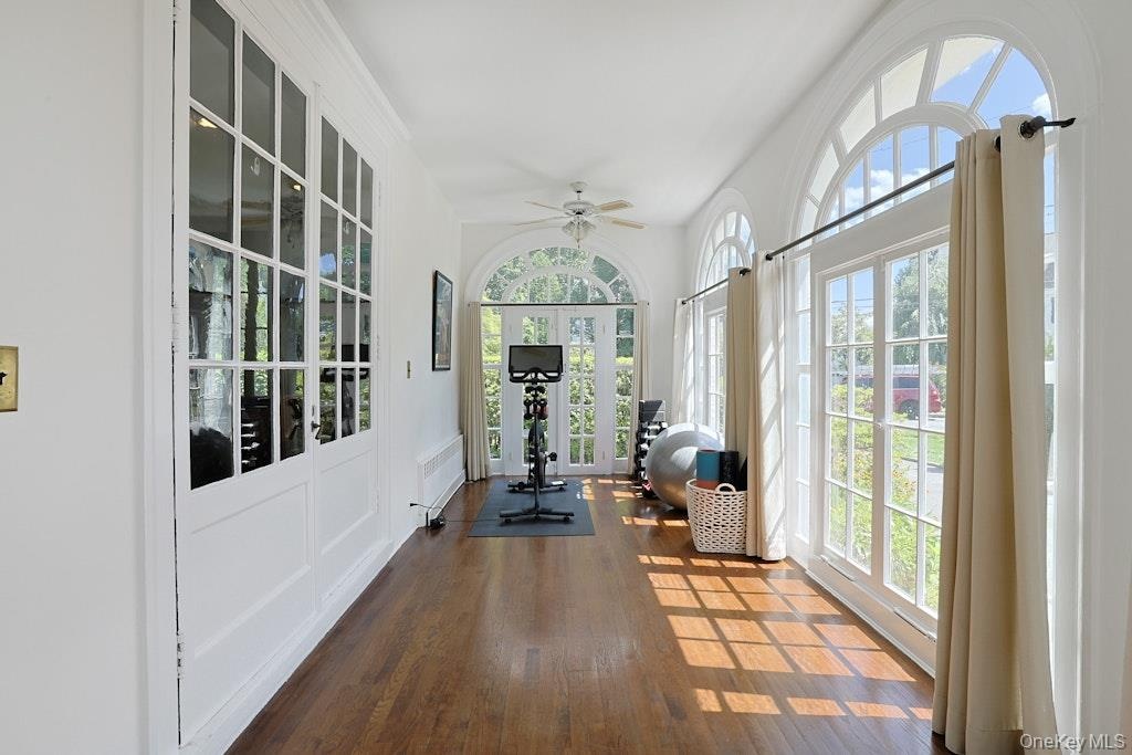 Work, Work Out, Play, Grow Orchids..Palladian Doors Are Oh-So Fitting!