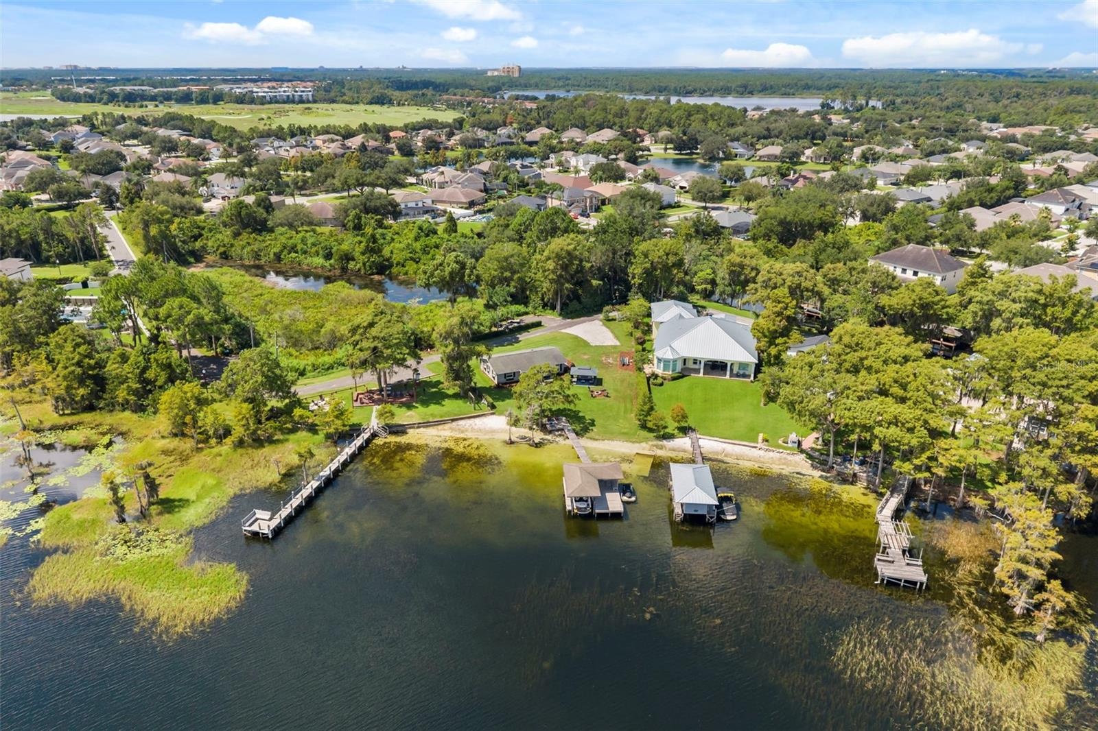 An exceptional opportunity to own one of the most compelling lakefront properties on Lake Cottage Lane, featuring an oversized homesite, expansive Lak