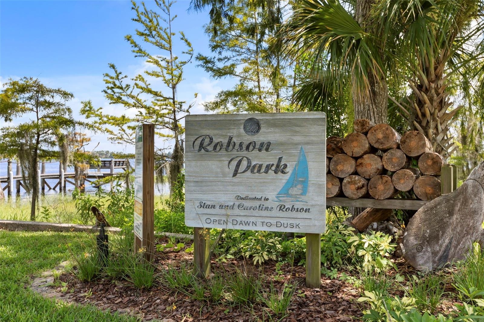 With no neighboring residence immediately on that side, the park creates an unusually open and private setting, allowing the lake, sky, and natural su