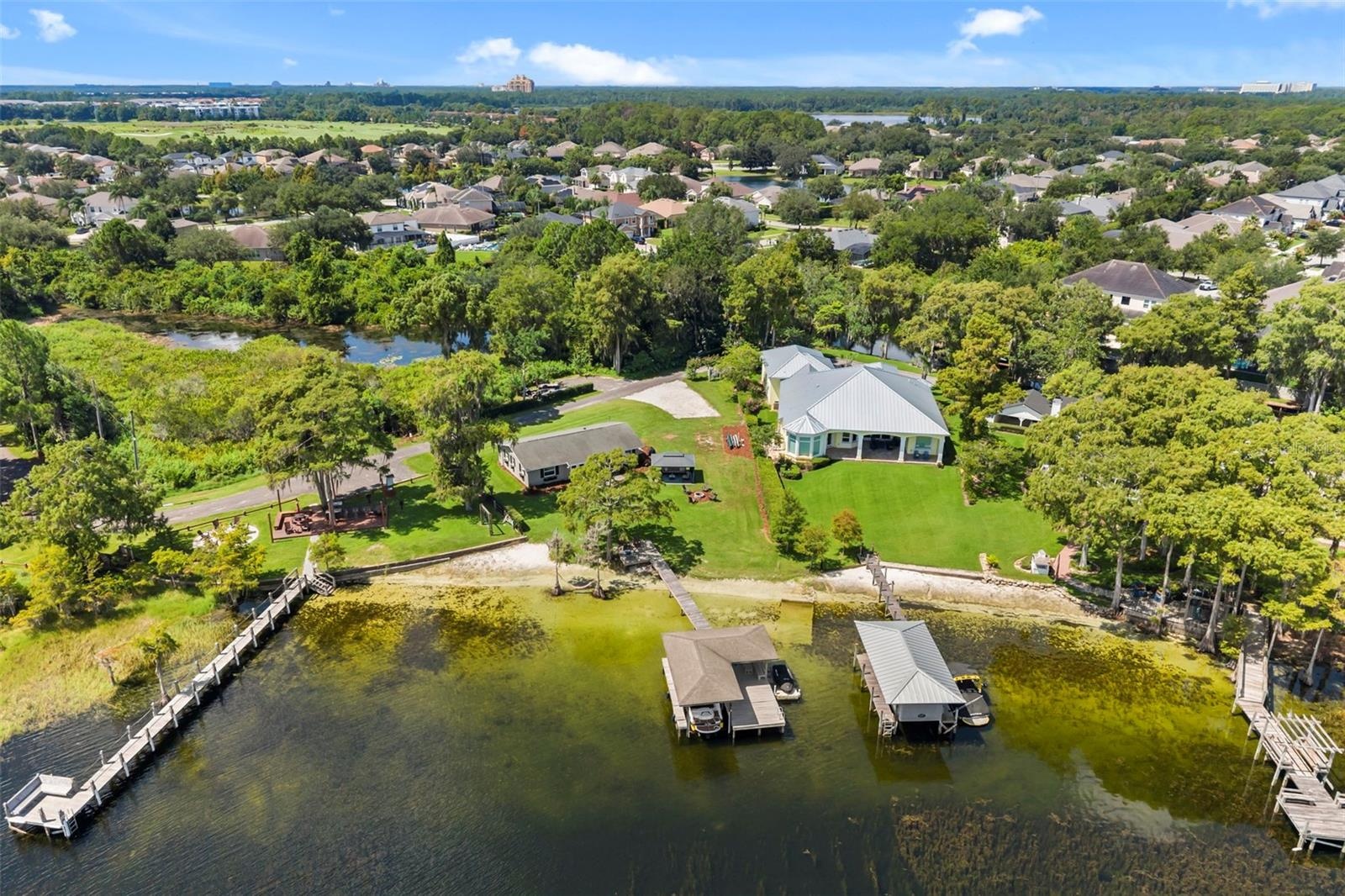 An exceptional opportunity to own one of the most compelling lakefront properties on Lake Cottage Lane, featuring an oversized homesite, expansive Lak