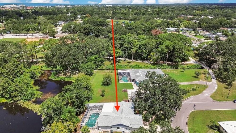 Trail to the right of the arrow goes to the parks