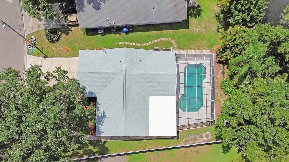 Rare pool home on the lake even looks clean from the sky