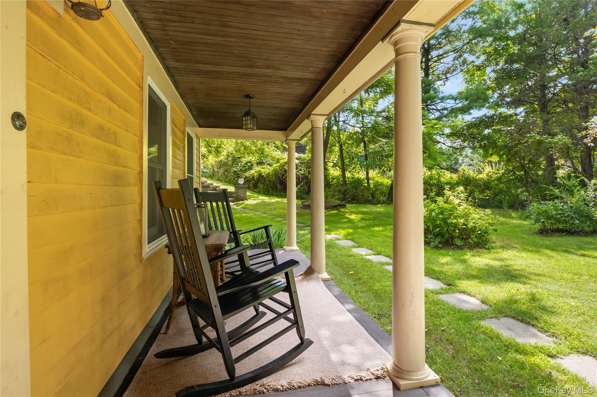 Covered front porch. Ideal for entertaining or relaxing