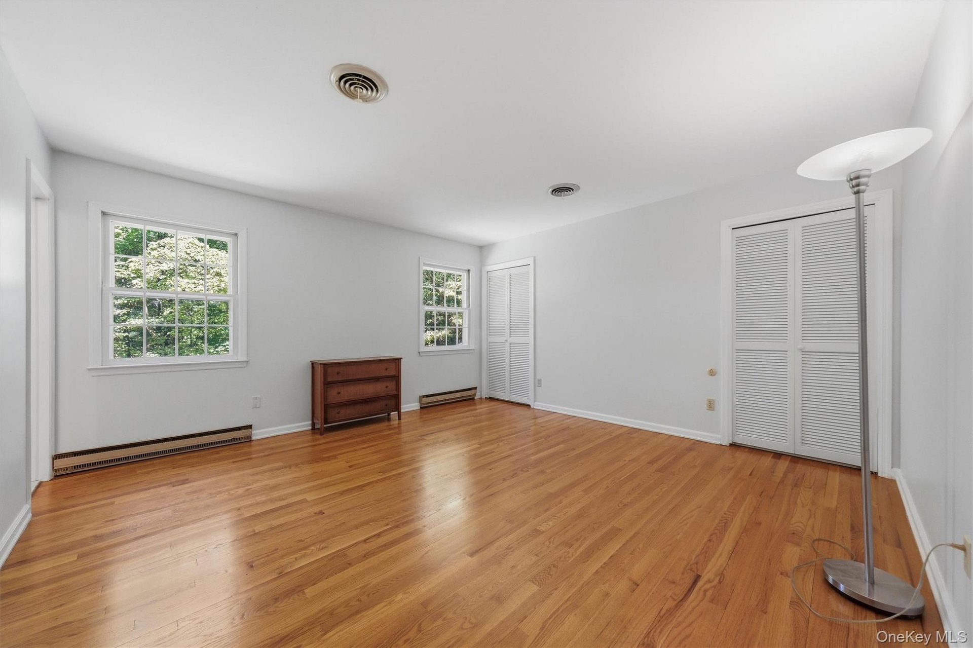Primary en suite with large walk-in closet and private bath