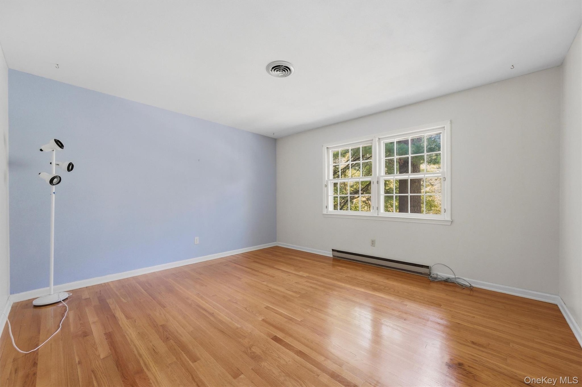 Bedroom 2 with hardwood floors