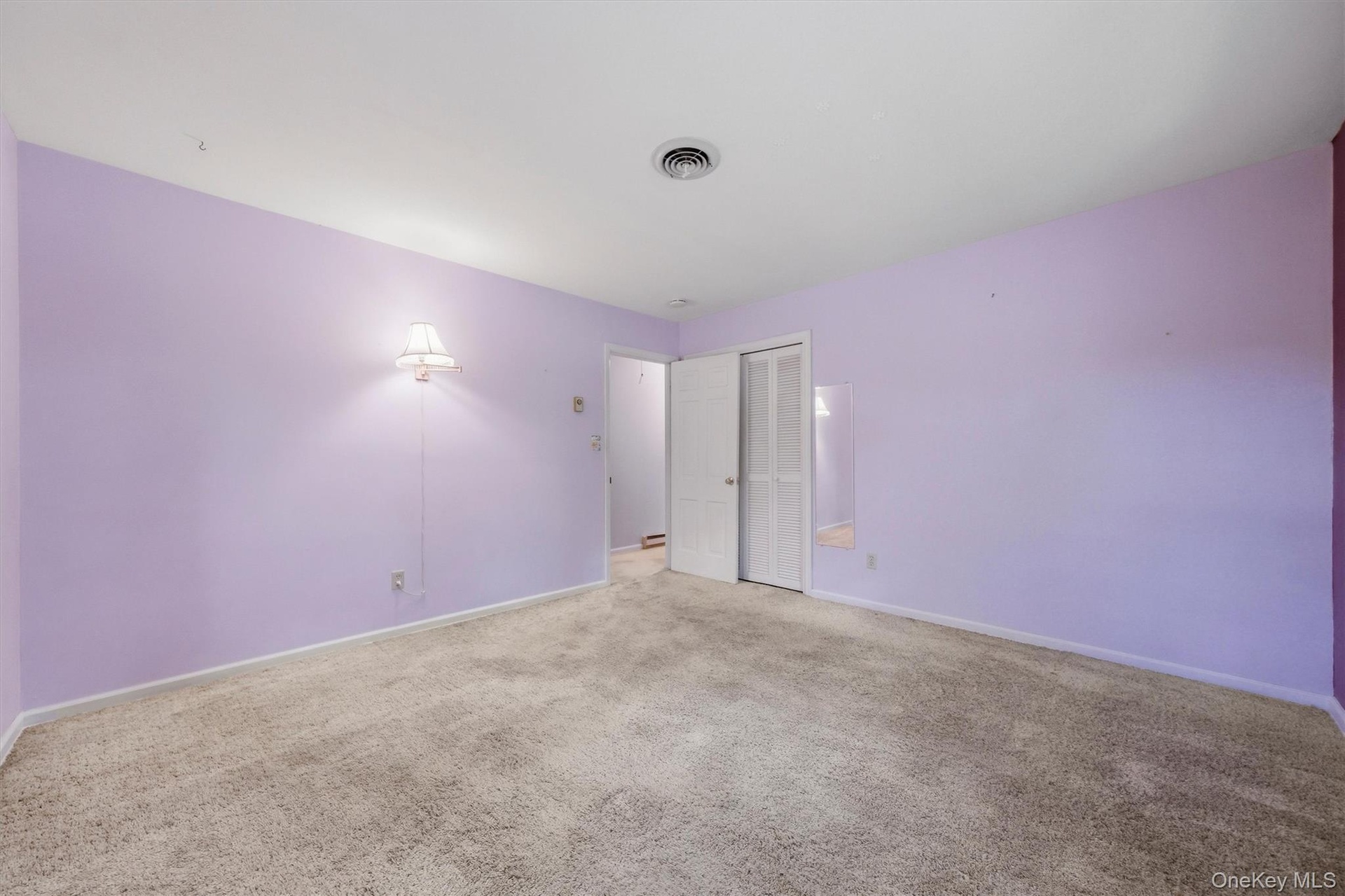 Bedroom 4 with HW floors under carpet