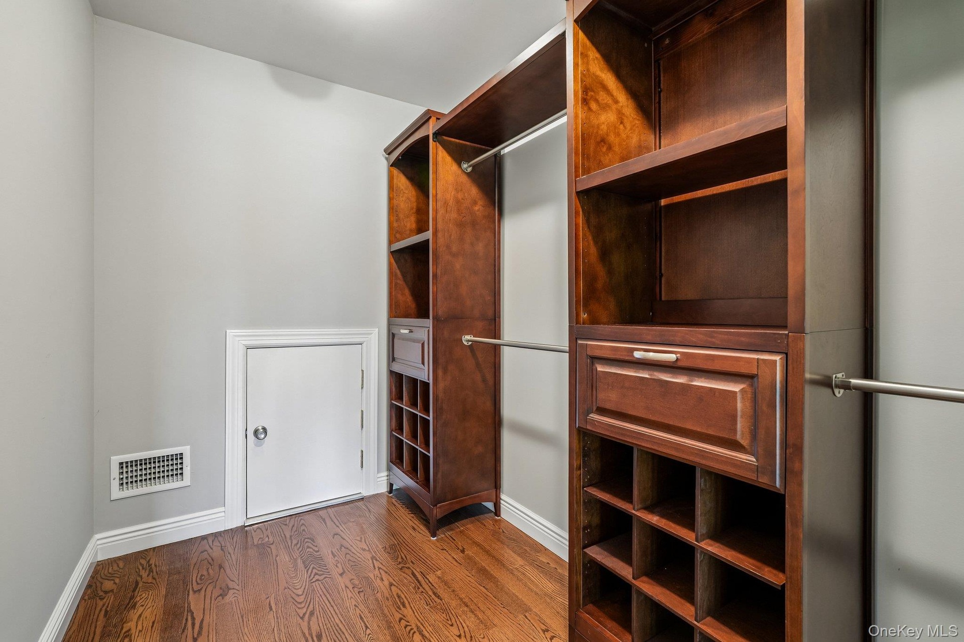 One Of Two Primary Walk In Closets