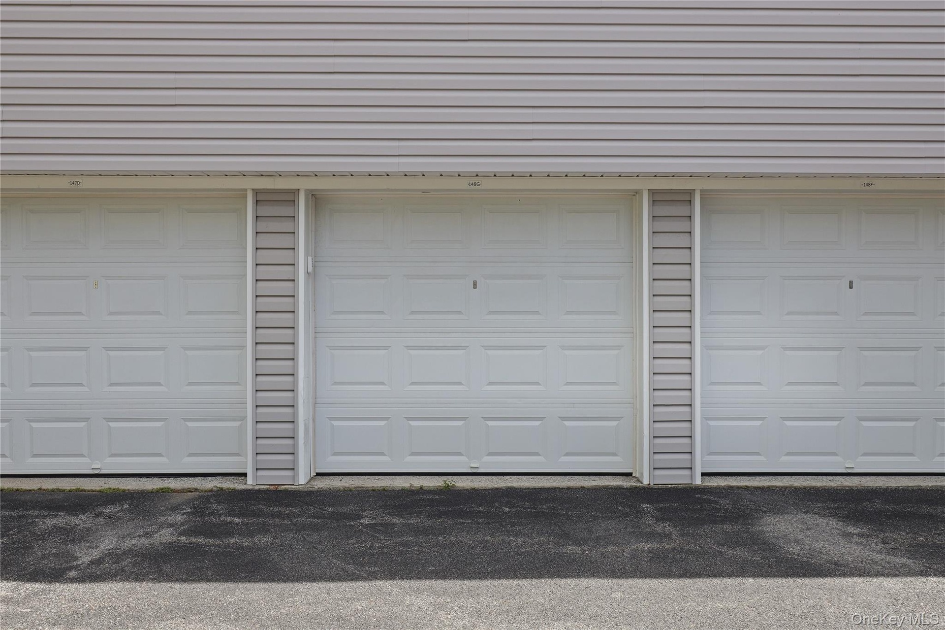 Garage is second to the right end. Separate storage space available behind garage.